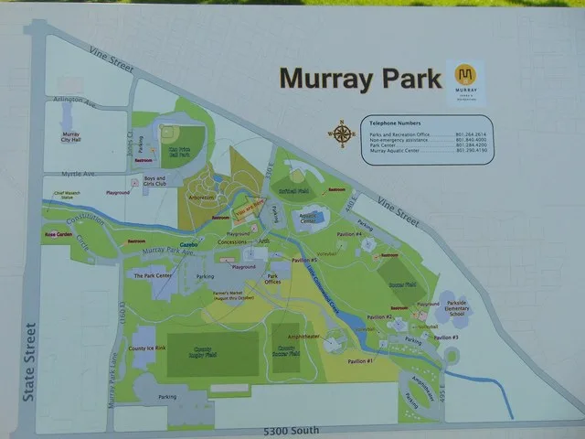 A sign showing a map of Murray City Park in Murray, Utah, that is located in the northern part of the part (as indicated on the sign), October 2016