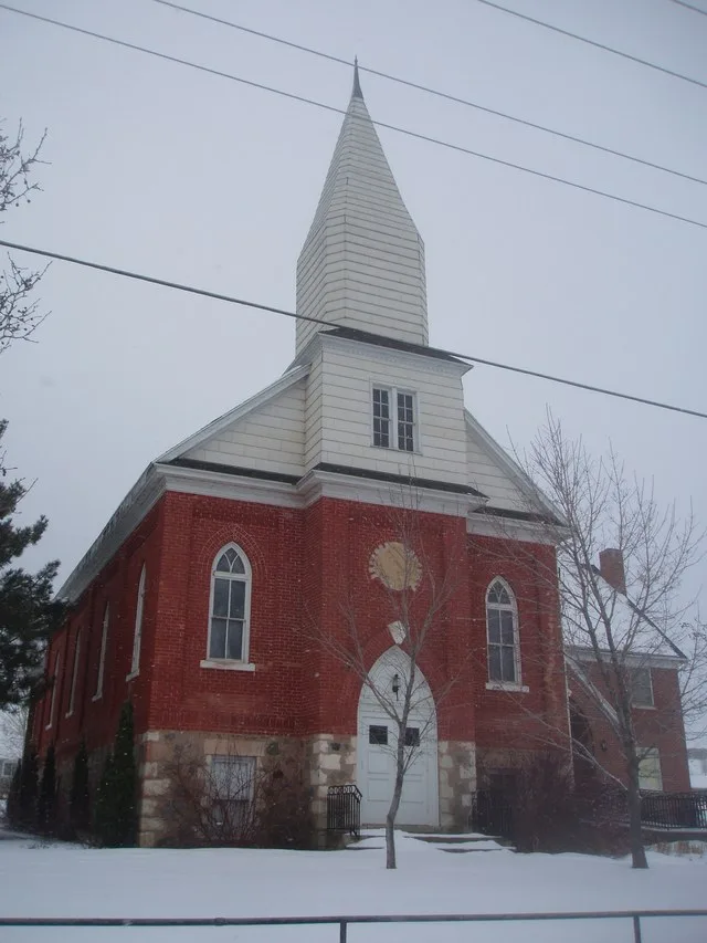 The Heritage Community Theatre, a landmark in the city of Perry , Utah , was formerly a meetinghouse of The Church of Jesus Christ of Latter-day Saints . Built in 1899, it was sol...