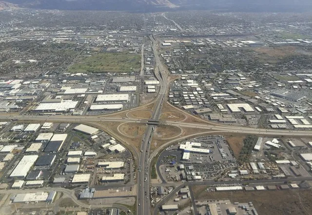 View east along Utah State Route 201 towards its interchange with Interstate 215 (foreground) and Interstate's 15 and 80 (background) along the border of Salt Lake City and West V...