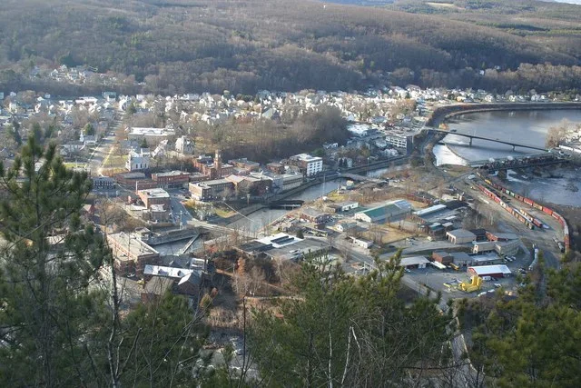 Village of Bellows Falls as seen from Fall Mountain in the early spring. The Connecticut River is on the right.
