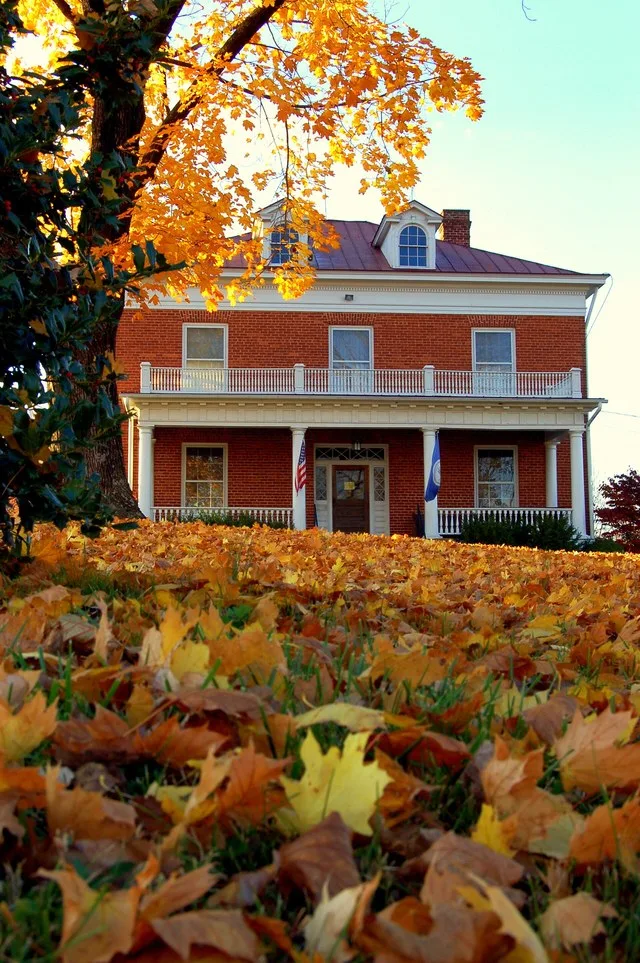 Building and lawn of the Amherst Historical Society in Amherst, Virginia, in the fall.