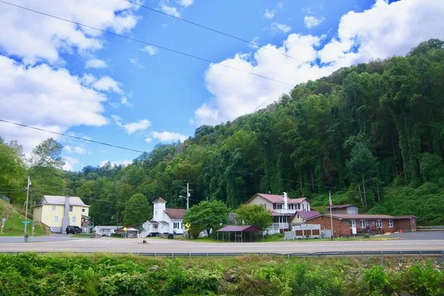 Buildings in Clinchco, Virginia, United States, viewed from Banner Street. Virginia State Route 63/83 is in the foreground.