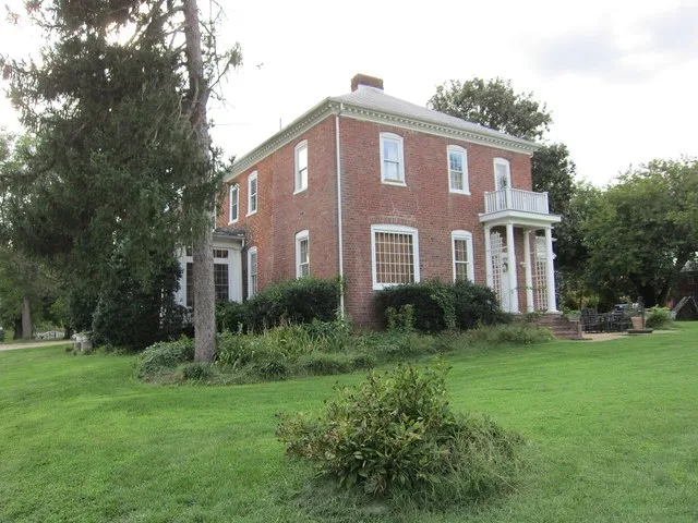 Henderson House , 3904 Fairfax Street, Dumfries , Virginia . Alexander Henderson built this home. Alexander Henderson was the father of Archibald Henderson , fifth Commandant of t...