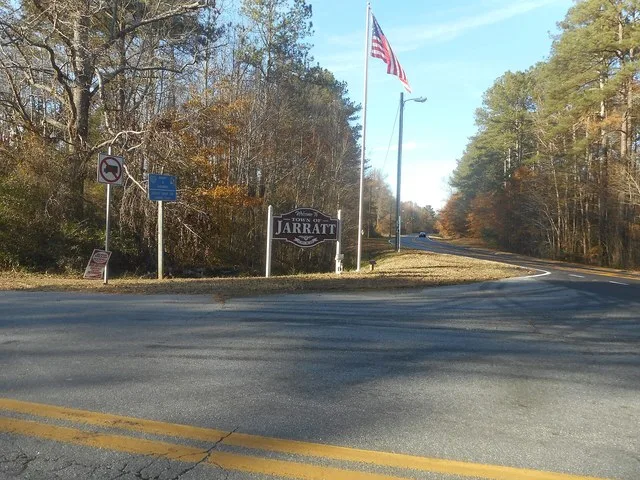 Welcome sign at the southwest corner of Virginia State Route 139 and Henry Road as seen from Henry Road in the Town of Jarratt, Virginia .