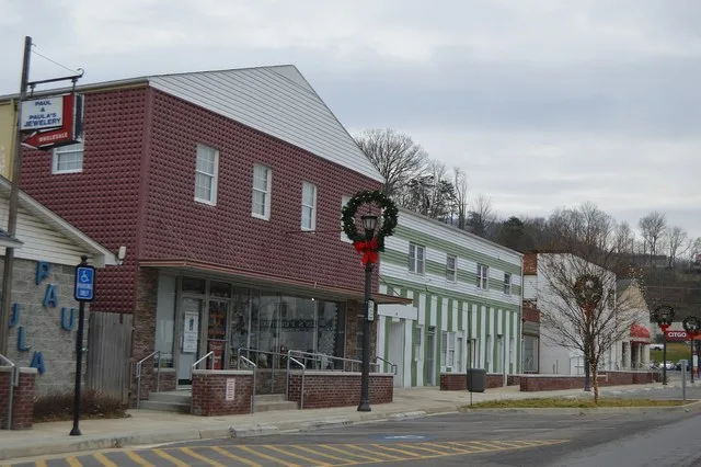 Buildings on the eastern side of Old Virginia Avenue, seen looking south from Knob Street, in Rich Creek , Virginia , United States .