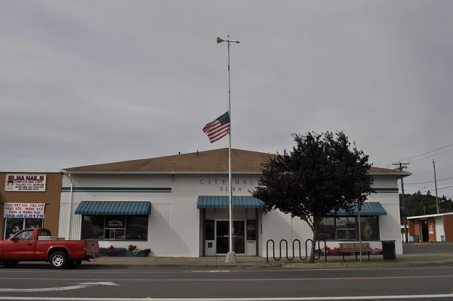 City Hall, Elma, Washington, USA. The flag was at half mast for the death of Ted Kennedy.