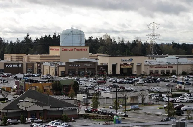 The north side of The Commons at Federal Way , a shopping center in Federal Way, Washington , seen from the parking garage at Federal Way Transit Center .
