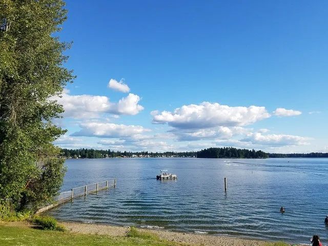 American Lake on a warm June day in 2019 in Pierce County, Washington, USA, as viewed from the American Lake north park.