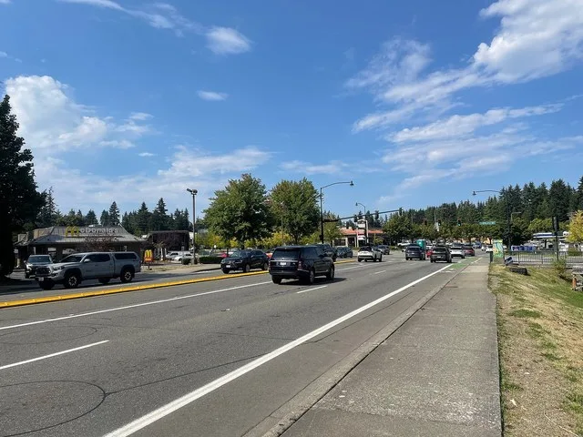Intersection between Coal Creek Parkway and Newcastle Way (the busiest intersection in the city of Newcastle). A McDonald's franchise is visible to the left, with the Newcastle Li...