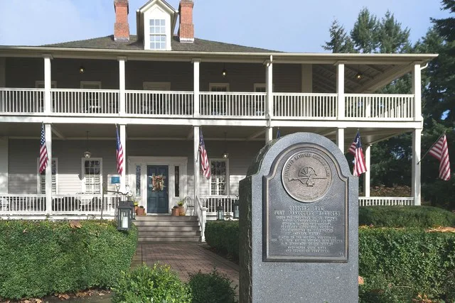 A plaque placed at the U. S. Grant House on Officers Row commemorating the listing of the Vancouver Barracks on the National Register of Historic Places