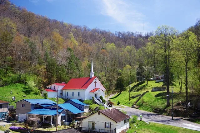 The United Baptist Church of Jesus Christ and other buildings in Kermit, West Virginia, United States.