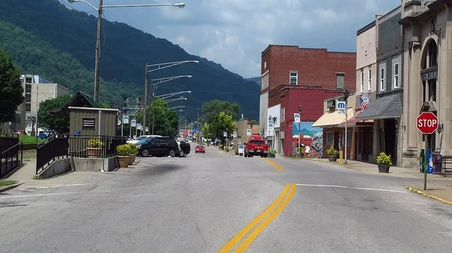 Looking west on Third Avenue in Montgomery, West Virginia. The Montgomery Amtrak station is on the left.