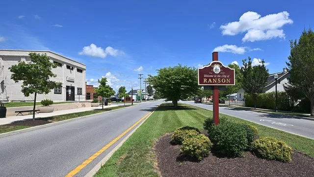 The welcome sign for Ranson, West Virginia on the border with Charles Town. This sign is in the median of South Fairfax Boulevard.