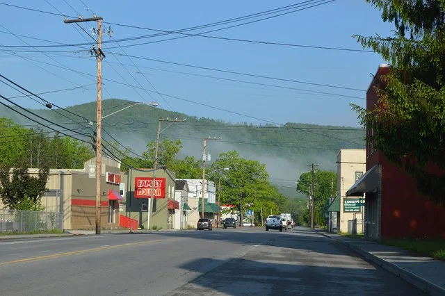 Buildings on U.S. Route 60 in central Rupert , West Virginia , United States , looking west toward the Seventh Street intersection.