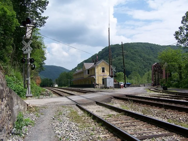 en:Thurmond, West Virginia , depot, now a en:National Park Service visitor center, and CR 25/2 bridge over the en:New River .