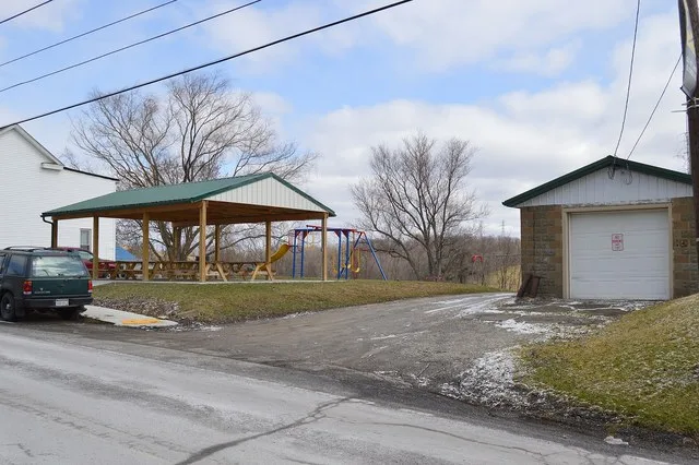 A small park along Main Street ( West Virginia Route 88 ) on the eastern side of West Liberty , West Virginia , United States . This was formerly the site of the West Liberty Pres...