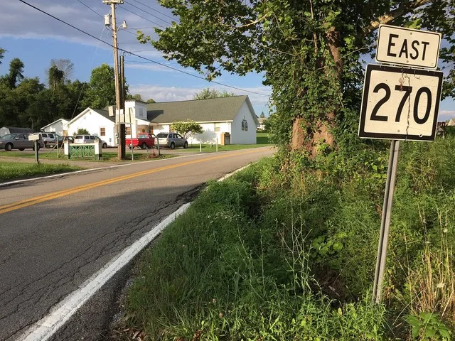View east along West Virginia State Route 270 (Main Street) at U.S. Route 19 (Milford Street) in West Milford, Harrison County, West Virginia