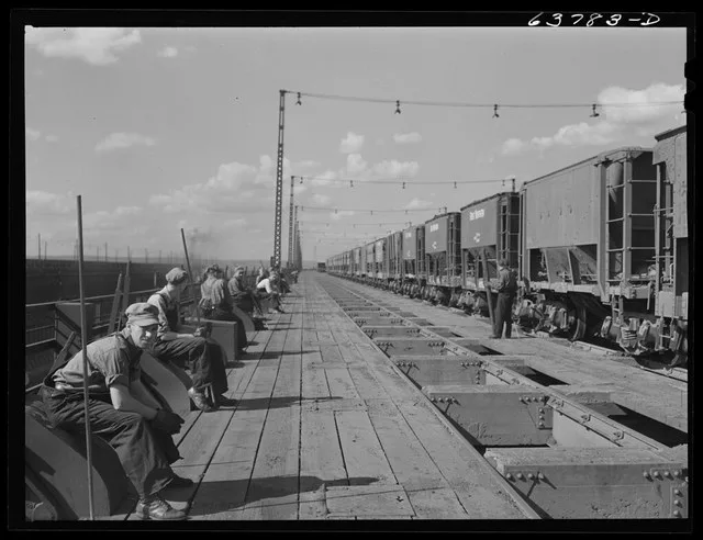 Ore punchers waiting for cars of iron ore to come in. Allouez, Wisconsin LOC jpg