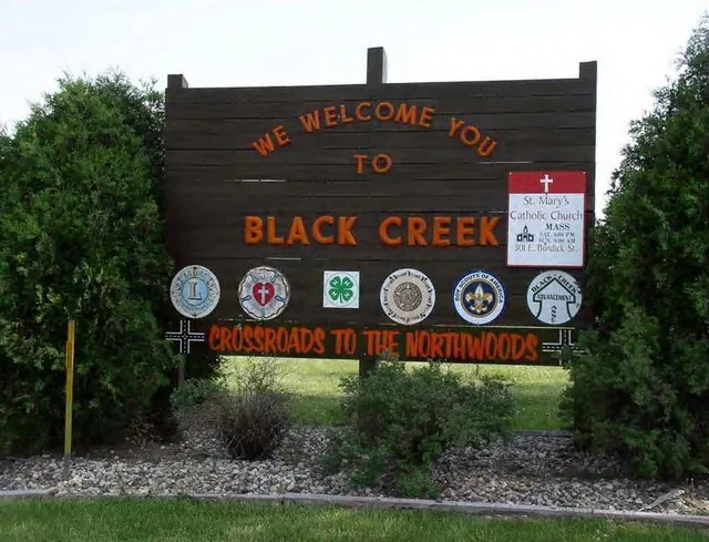 Village welcome signage for Black Creek, Wisconsin. Replaced in 2017.