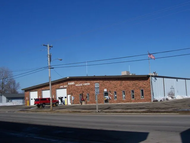 Looking northwest at the village center and fire station for w:Dane, Wisconsin (the village, not the county) on w:Wisconsin Highway 113 .