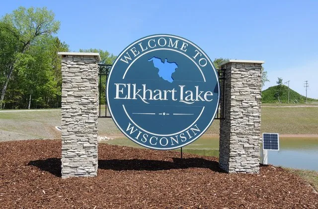 Village of Elkhart Lake welcome sign on Highway 67 as seen in May 2025.