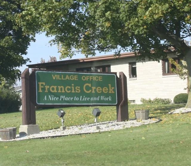 The village hall for w:Francis Creek, Wisconsin .