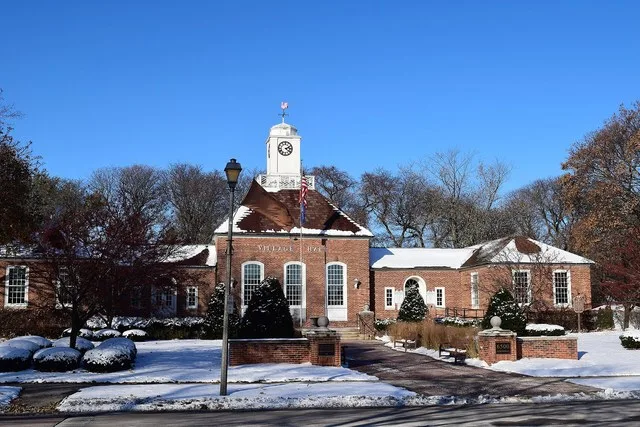 The village hall in the village of Greendale, Wisconsin . The hall is part of the Greendale Historic District .