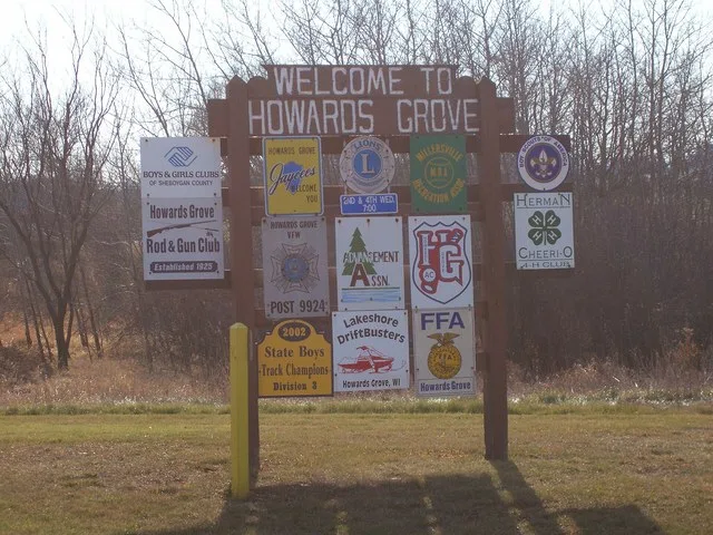 Looking south at the welcome sign for Howards Grove, Wisconsin, USA.