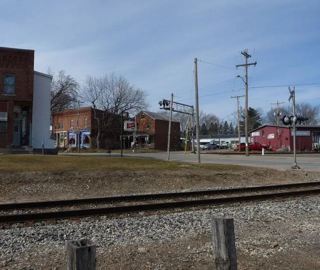 Old buildings and signal lights at the main crossing in town