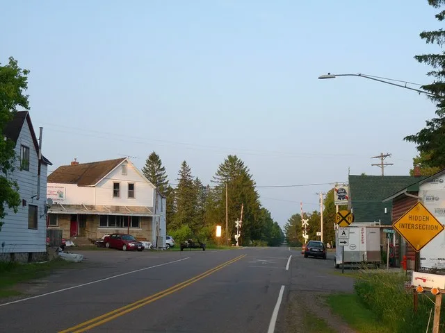 Lublin is a small rural hamlet in north central Wisconsin. Pictured is the main junction looking east, where County F crosses the railroad track.
