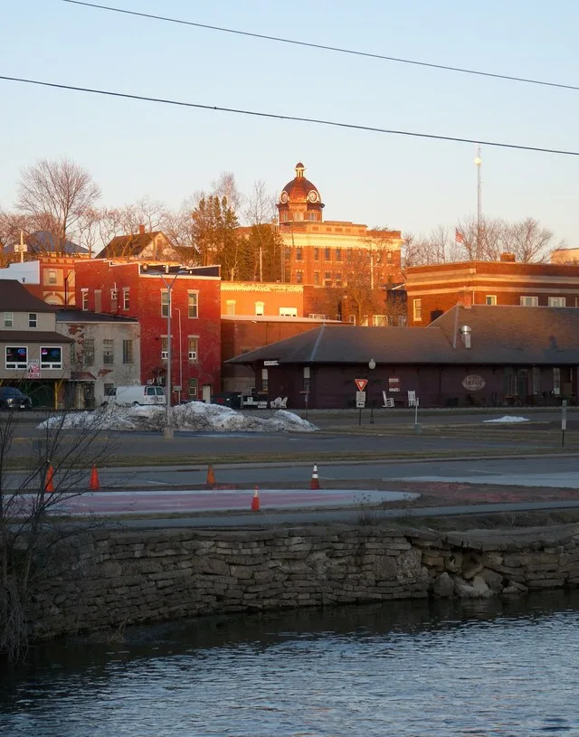 Medford is a small city in north-central Wisconsin. Pictured are the Little Black River in the foreground, then the old depot, then a bit of the downtown, then the Taylor County c...