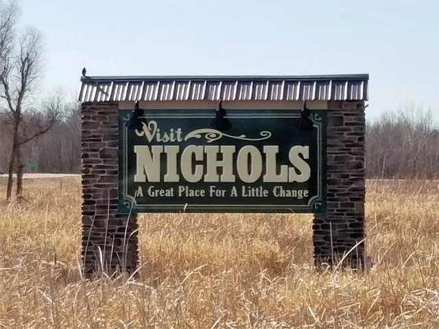 Marketing welcome signage for Nichols, Wisconsin along WIS 47