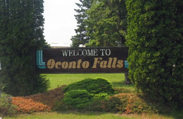 The Oconto Falls greeting sign, facing Hwy 22-West, on the northeast side of the city