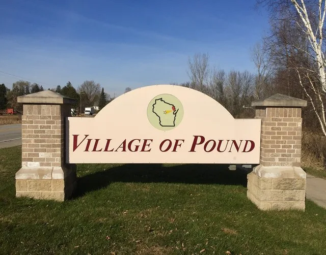 Pound, Wisconsin entrance sign