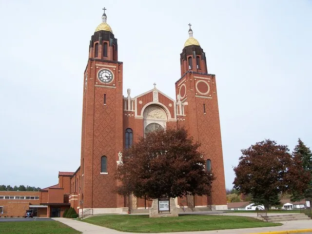 The Assumption of the Blessed Virgin Mary Catholic church in w:Pulaski, Wisconsin , United States. This church is at the intersection in this image: Image:Wis160EastTerminus.jpg (...