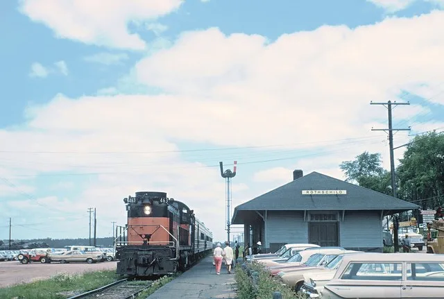 MILW 463 Alco (RS-3) with Train 202, the former North Woods Hiawatha at Rothschild, Wisc. in July 1967