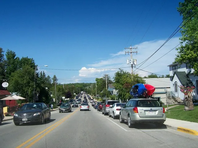 Looking north at downtown w:Sister Bay, Wisconsin on w:Wisconsin Highway 42 , showing the typical backups with tourist traffic.