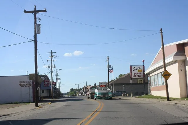 Looking north at downtown Wausaukee on U.S. Route 141 .