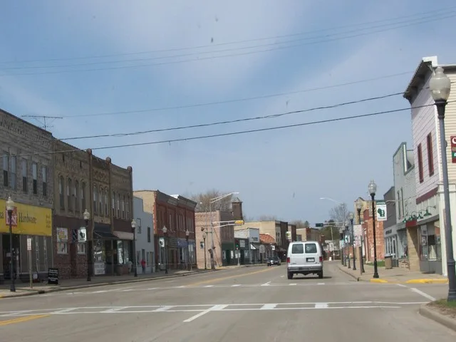 Looking west at downtown w:Wautoma, Wisconsin , USA on w:Wisconsin Highways 21 .