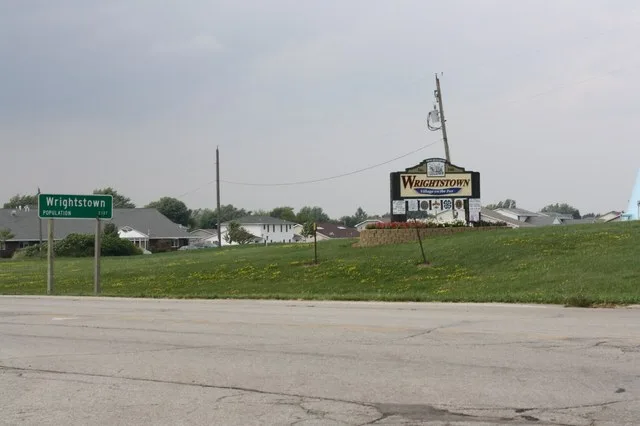 The welcome and road signs for w:Wrightstown, Wisconsin on w:Wisconsin Highway 96 on the southeast side of the village.