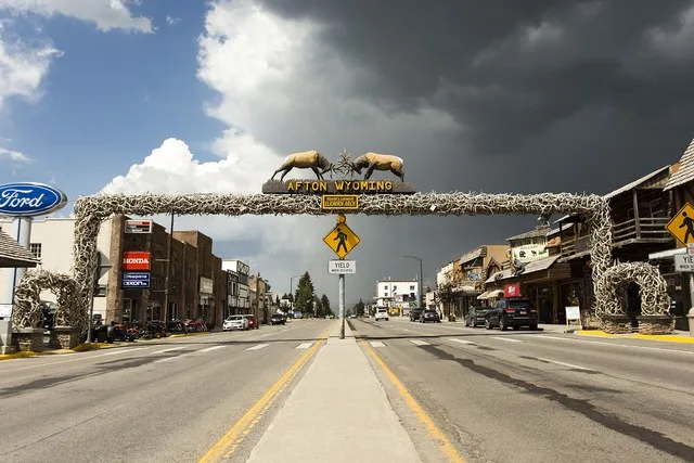 Photograph along US 89 going through Afton, Wyoming looking at the elk horn arch. Photograph was taken facing north, handheld, standing on the center median on the 31st of July 20...